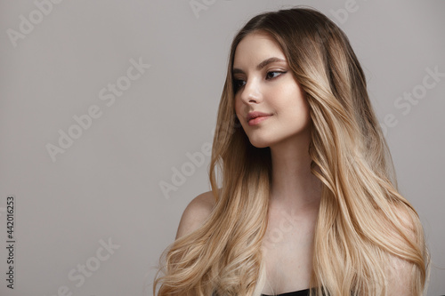 Fashion woman portrait with long wavy hair