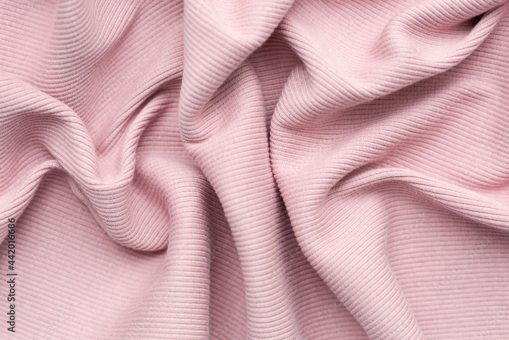 pink background texture of knitted wool. Knitted fabric. pink background texture of knitted wool. Knitted fabric.