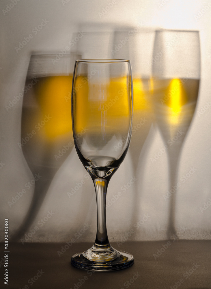 Concept, a glass and sparkling wine with glass reflections