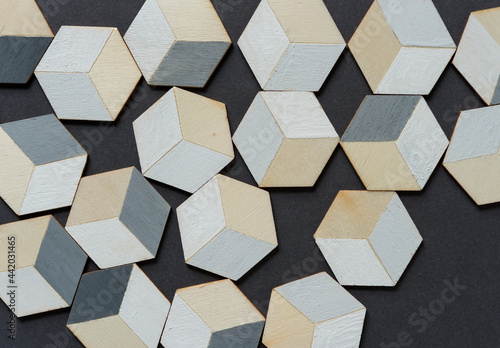 hand-painted (gray and white) painted trompe l'oeil (hexagonal) cubes on dark gray background