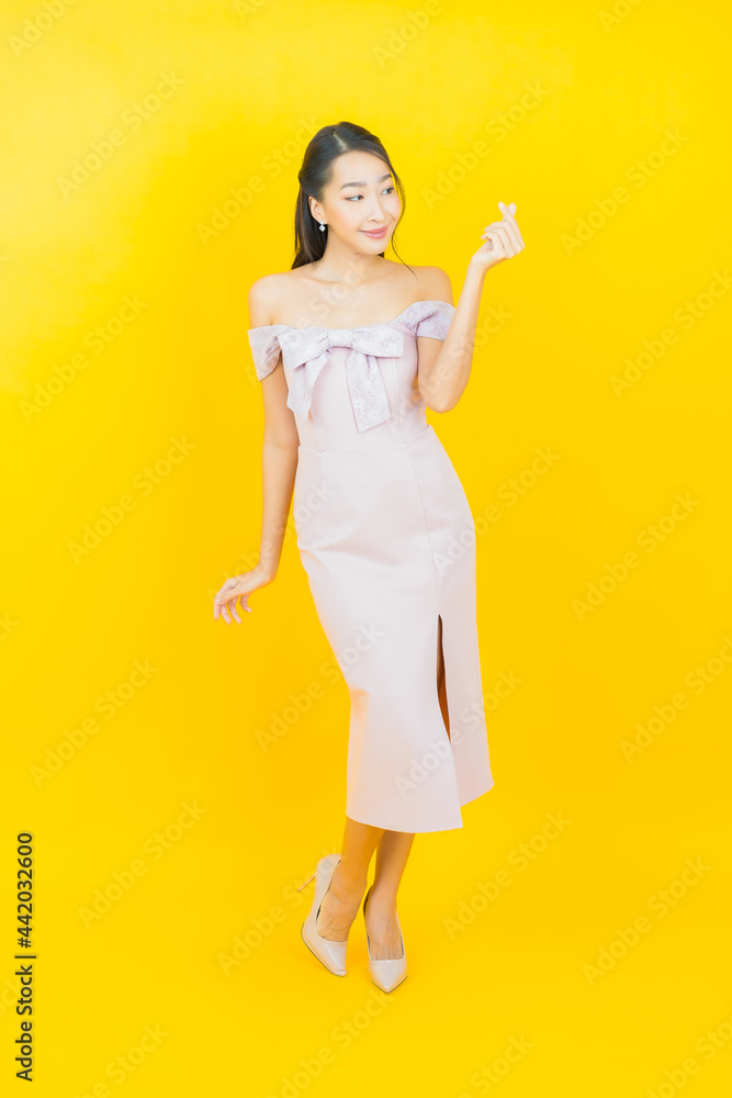 Portrait beautiful young asian woman smile with action Portrait beautiful young asian woman smile with action