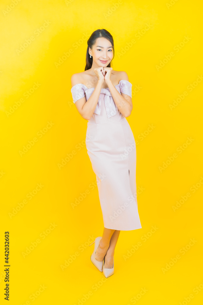 Portrait beautiful young asian woman smile with action Portrait beautiful young asian woman smile with action