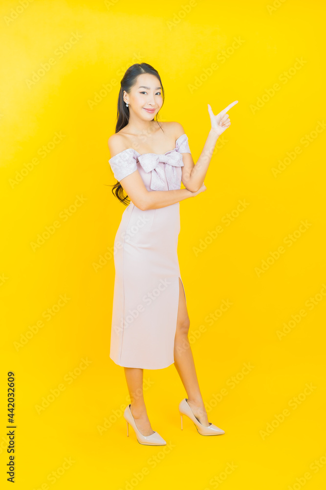 Portrait beautiful young asian woman smile with action Portrait beautiful young asian woman smile with action