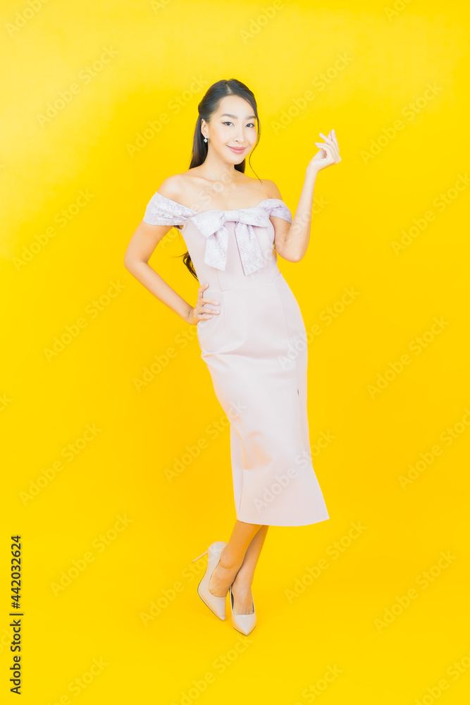 Portrait beautiful young asian woman smile with action Portrait beautiful young asian woman smile with action