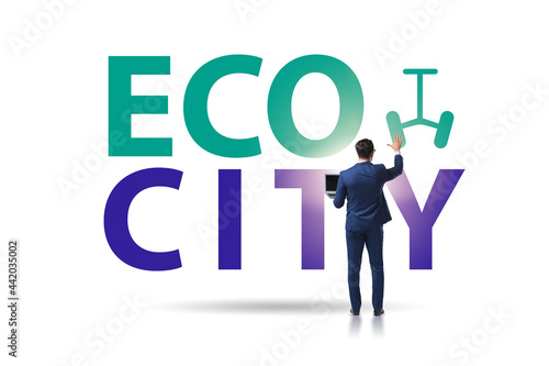 Eco city in ecology concept with businessman