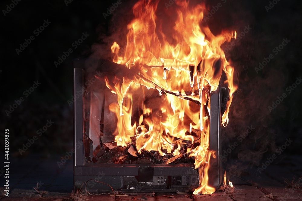 TV burning with broken screen