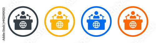News presenter on TV Show vector icon. Conference icon with journalist sitting behind a desk with microphone symbol. International business meeting concept.