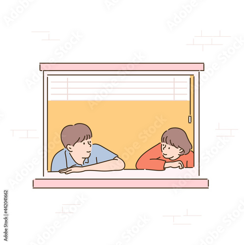 A couple is leaning against the window and looking at each other. hand drawn style vector design illustrations. 