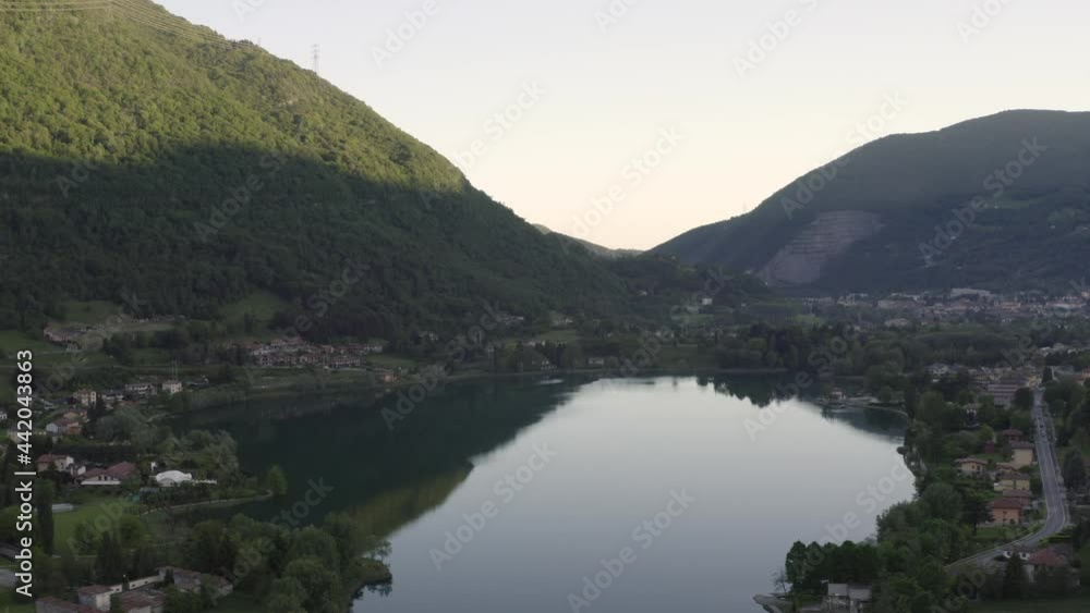 Drone flying over Lake Endine with the mountains in the background,Lombardy,Italy. Drone flying over Lake Endine with the mountains in the background,Lombardy,Italy.