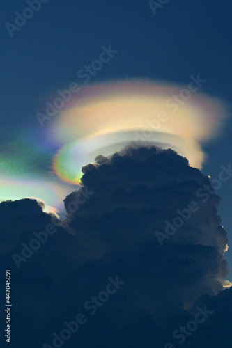 Iridescent Pileus Cloud on the sky