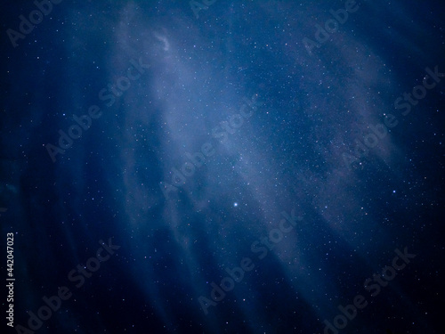 wispy clouds with stars