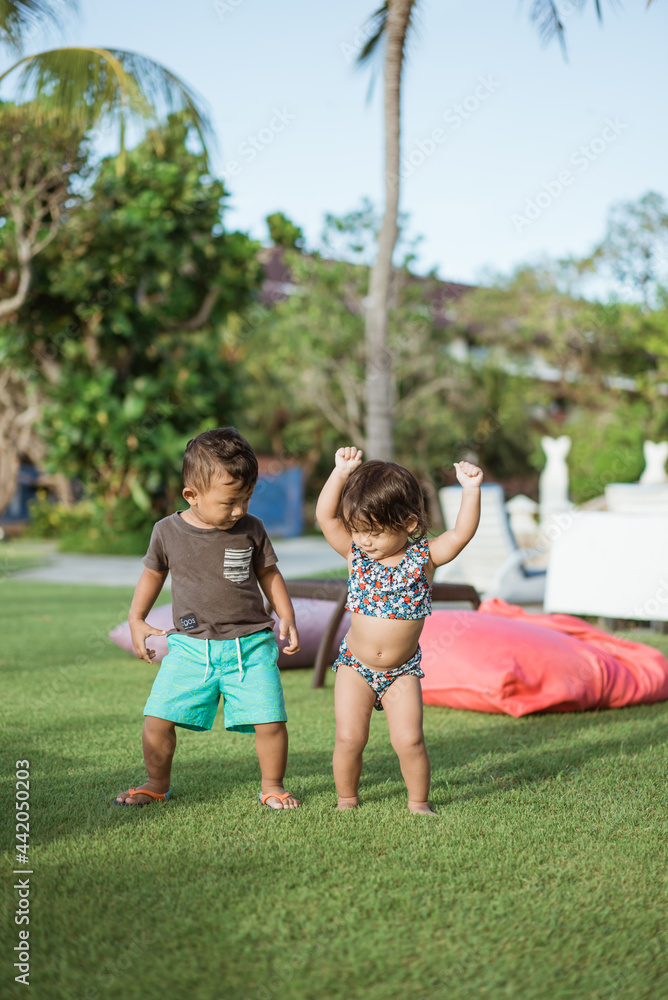 healthy cute asian fun toddler enjoy dancing outside together healthy cute asian fun toddler enjoy dancing outside together