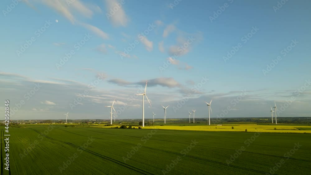 Wind turbines spinning renewable energy windmill rotating electricity