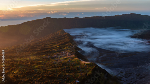 Mount Bromo twilight sky sunrise time with fog nature landscape background, Java, Indonesia.
