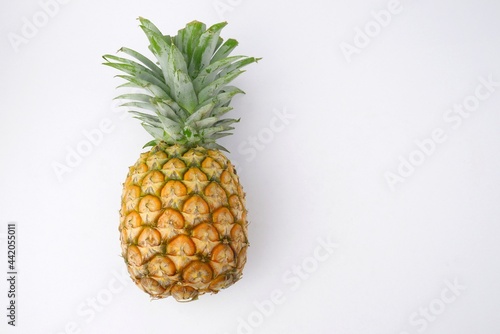 fresh yellow pineapple isolated on white background