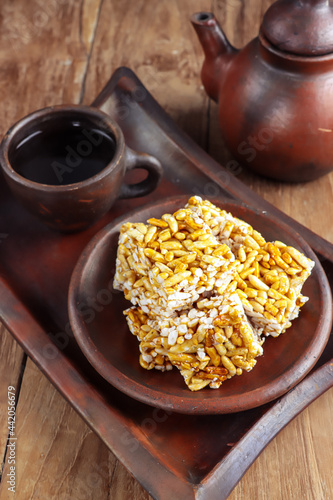 Kue Jipang, gipang, bipang or teng teng beras is Indonesian traditional cereal made from rice crispy with Sticky sugar. photo