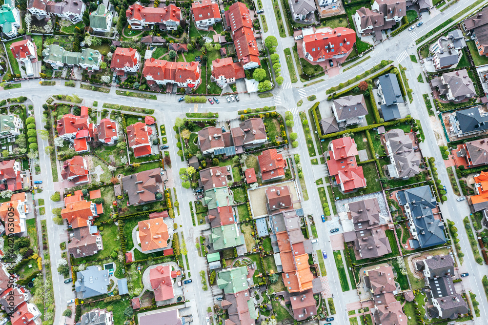aerial top view of houses in beautiful residential neighborhood during summer season aerial top view of houses in beautiful residential neighborhood during summer season