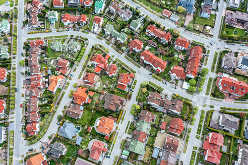 Wallpaper Mural aerial top view of a neighborhood in the suburban area with homes and intersecting streets Torontodigital.ca