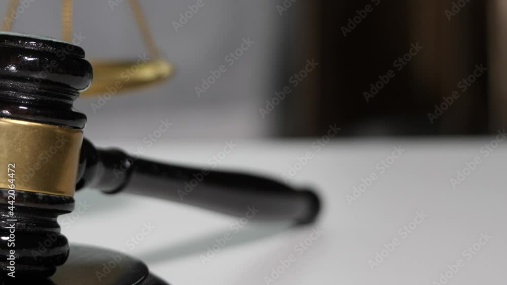Equipment lawyer gavel being struck to decide an auction or guilty verdict in court Equipment lawyer gavel being struck to decide an auction or guilty verdict in court