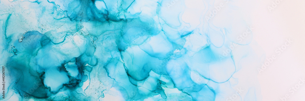 art photography of abstract fluid painting with alcohol ink, blue colors