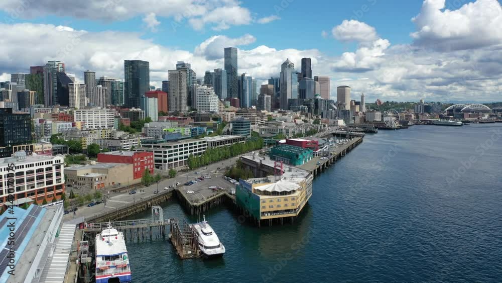 Cinematic 4K aerial trucking drone clip of Belltown, Alaskan Way waterfront, cruise terminal, Pike Place, Seattle Aquarium, Elliott Bay, Lumen Field, Great Wheel downtown Seattle Washington Cinematic 4K aerial trucking drone clip of Belltown, Alaskan Way waterfront, cruise terminal, Pike Place, Seattle Aquarium, Elliott Bay, Lumen Field, Great Wheel downtown Seattle Washington