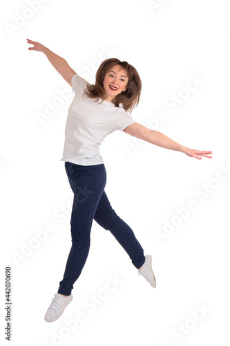 Happy girl makes dance move...