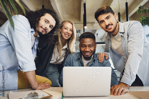 Group office portrait of happy diverse colleagues