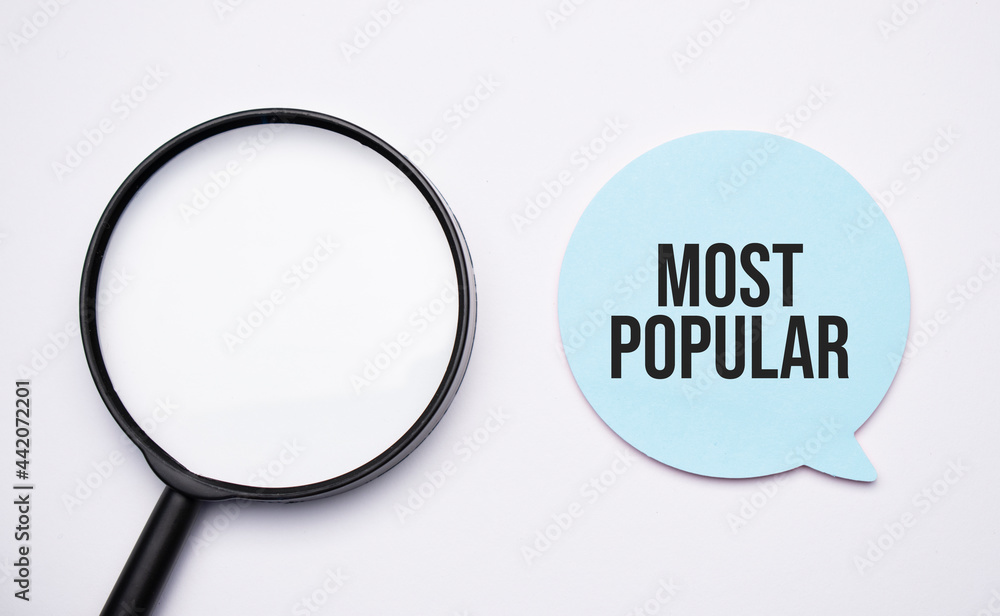 most popular speech bubble and black magnifier isolated on the yellow background. - obrazy, fototapety, plakaty 