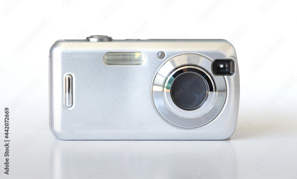 Old digital camera isolated, obsolete and not in use anymore Old digital camera isolated, obsolete and not in use anymore