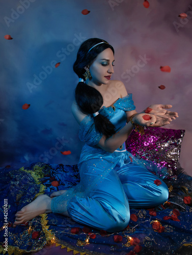Beautiful princess closeup on the night background. Art photo.Jasmine princess cosplay.
