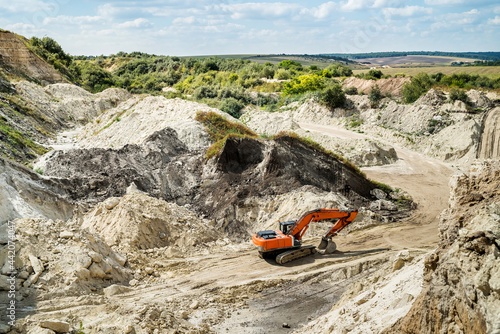 mining in sand quarry in summer time