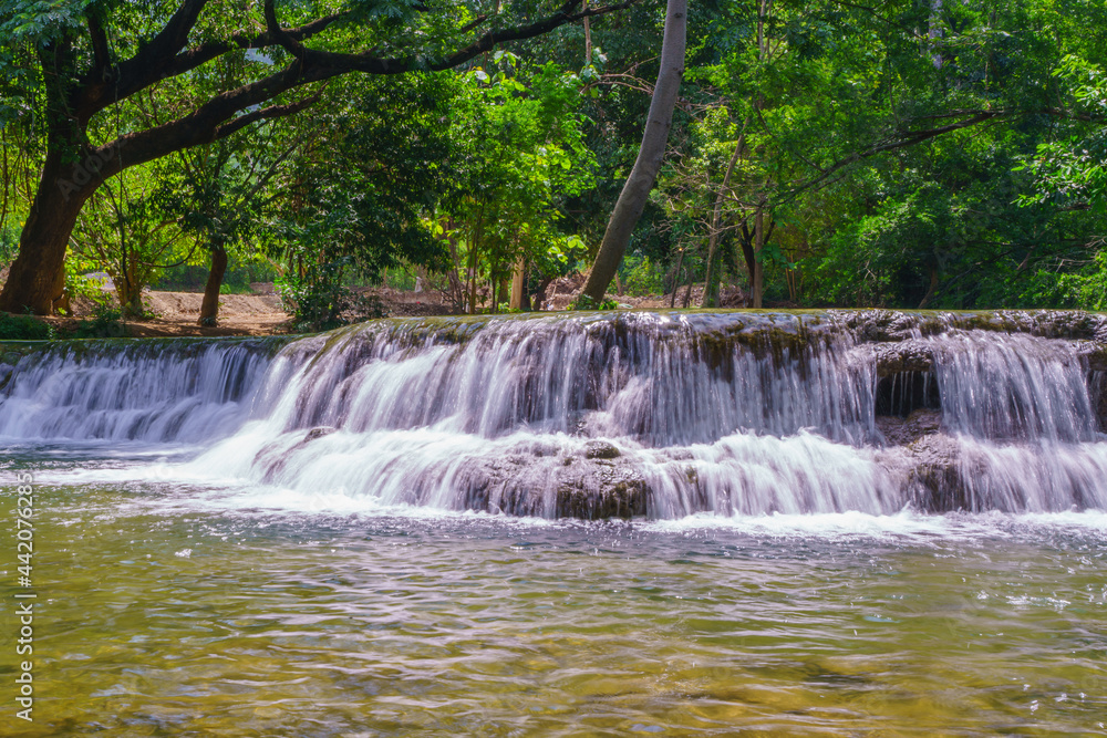 Fototapeta premium Waterfall in rain forest at Chet Sao Noi waterfall National Park