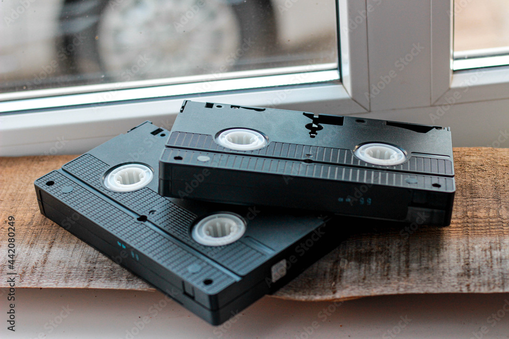 Obraz premium cassette, tape, isolated, audio, music, video, technology, sound, data, white, digital, equipment, old, media, plastic, computer, record, recording, object, magnetic, retro, cd, black, camera, stereo