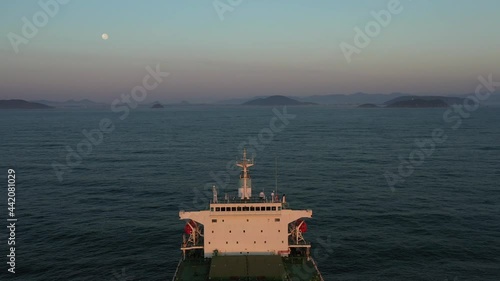 4K(24fps) Fly above panamax size bulk carrier vessel. photo