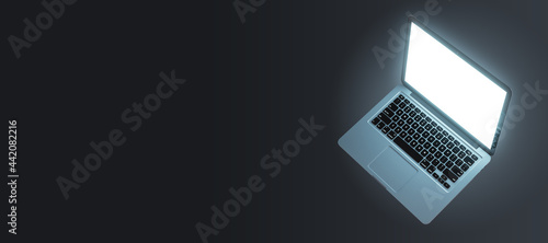 Empty laptop computer with white screen on grey background with mock up place for ad. Technology and device concept. 3D Rendering.