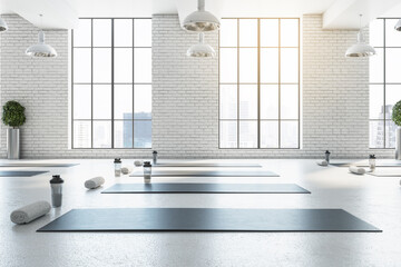 Fotobehang Fitness Witte yogastudio met bakstenen muur  © Who is Danny