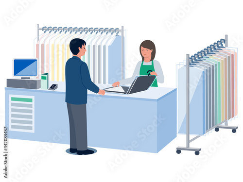 クリーニング店でスーツを受け取る男性と受け渡しをする女性店員のベクターイラスト