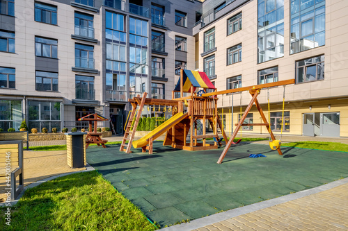 playground on the territory of a modern multi-storey residential complex © hiv360