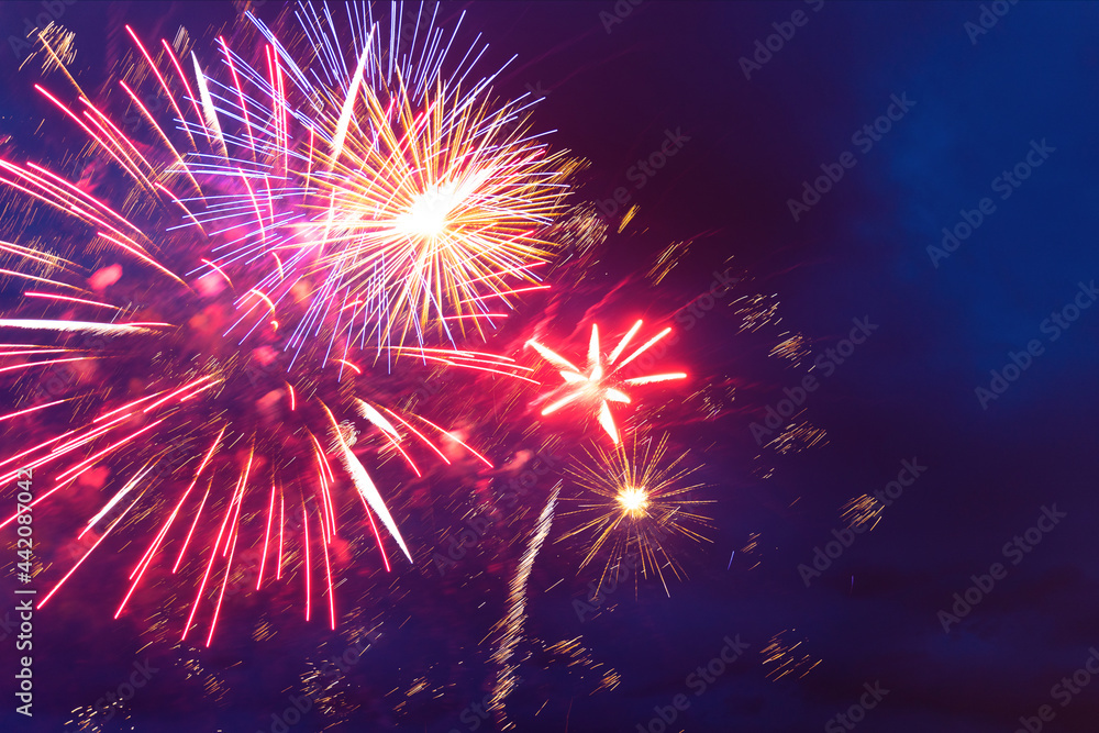 Fototapeta premium Fireworks in the night sky. Independence Day, 4th of July, Fourth of July or New Year
