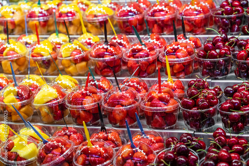 Fresh Red Strawberries And Cherries For Sale In Fruit Market