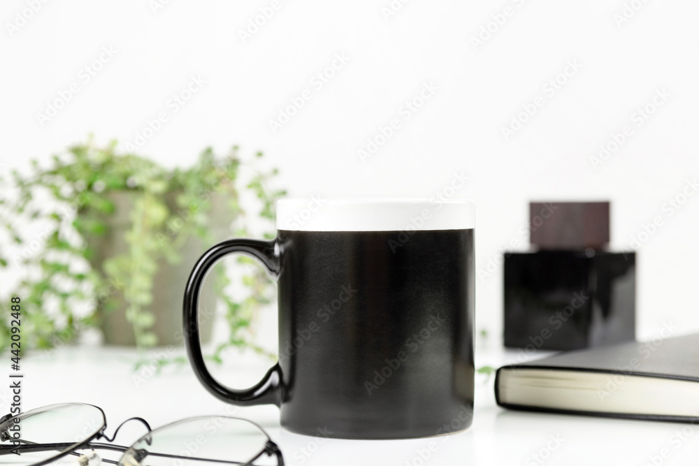 Black dad coffee mug mockup on workplace. Cup mock up for male style design Black dad coffee mug mockup on workplace. Cup mock up for male style design