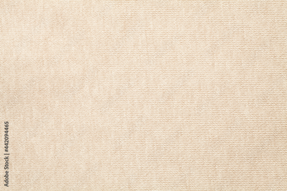Fototapeta premium Beige cotton cloth texture texture background. Close-up.