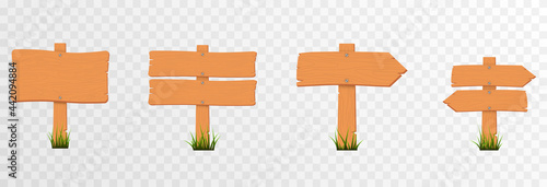 Set of cartoon wooden pointers, signs on green grass. Wooden pointers, plaques on an isolated transparent background. PNG.