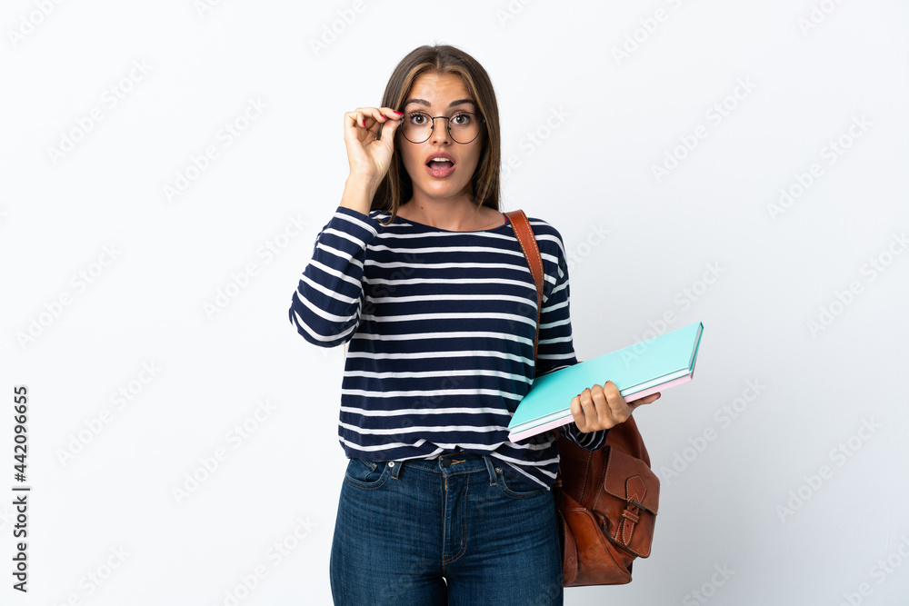 Young student woman isolated on white background with glasses and surprised Young student woman isolated on white background with glasses and surprised