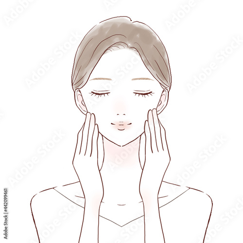 フェイスマッサージをする女性