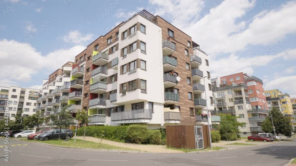 An apartment building in a suburban apartment complex - a road in the foreground An apartment building in a suburban apartment complex - a road in the foreground