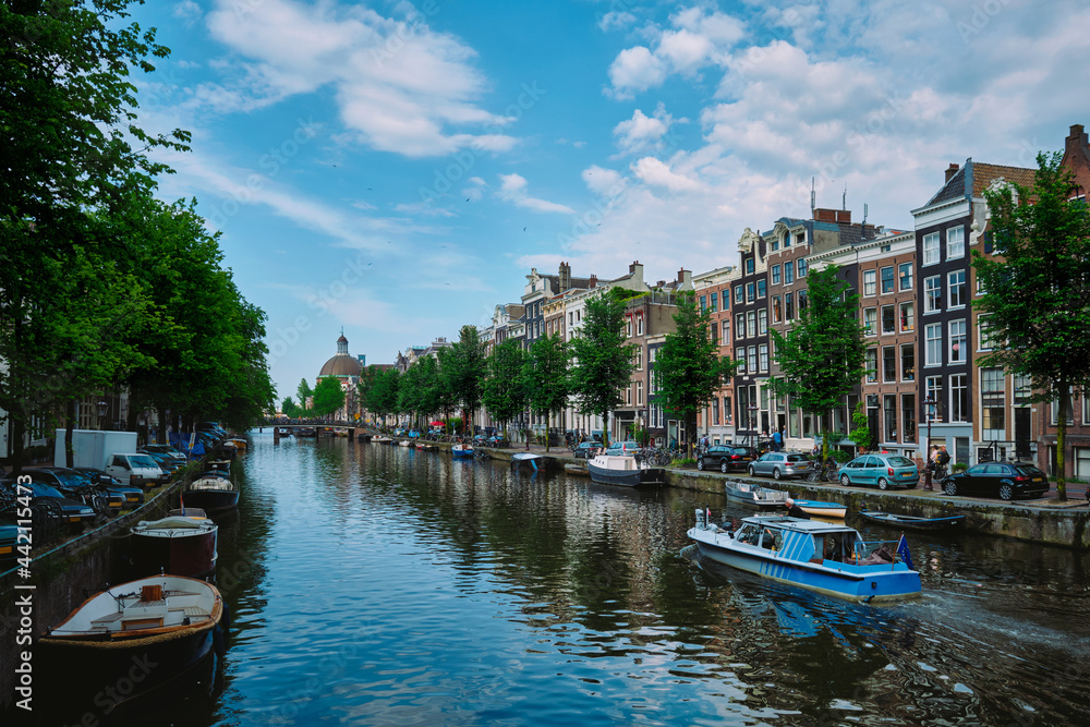 Singel canal in Amsterdam with houses. Amsterdam, Netherlands