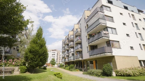 An apartment building in a suburban apartment complex with greenery
