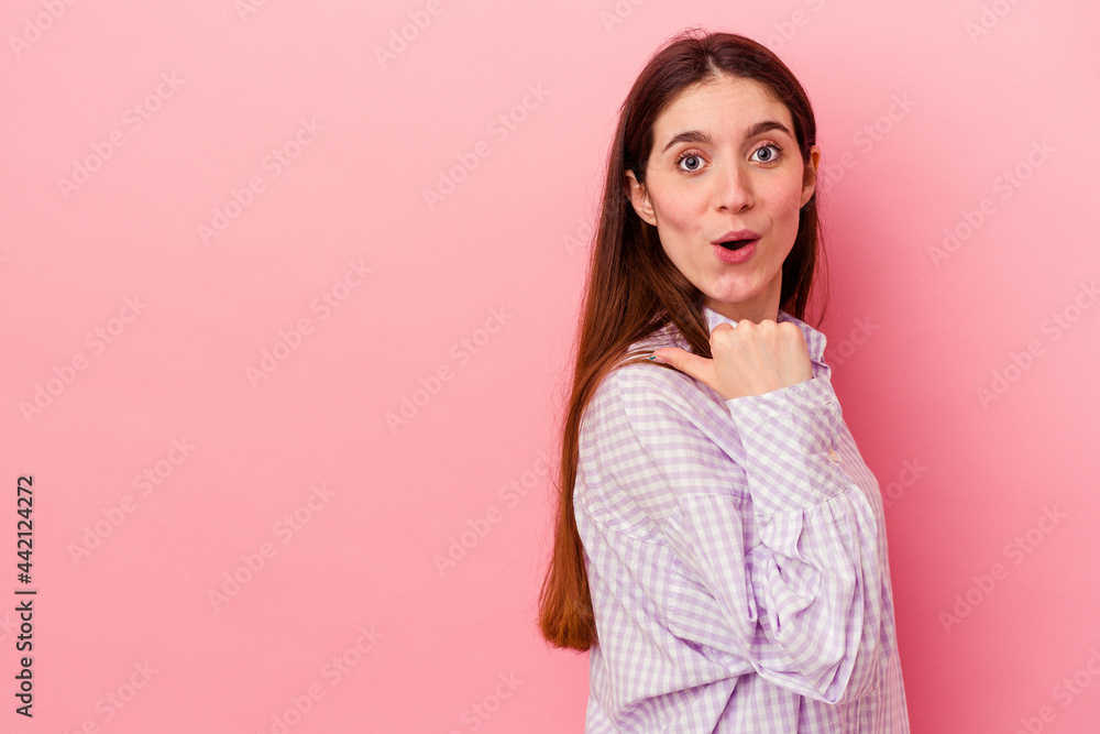points with thumb finger away, laughing and carefree. points with thumb finger away, laughing and carefree.