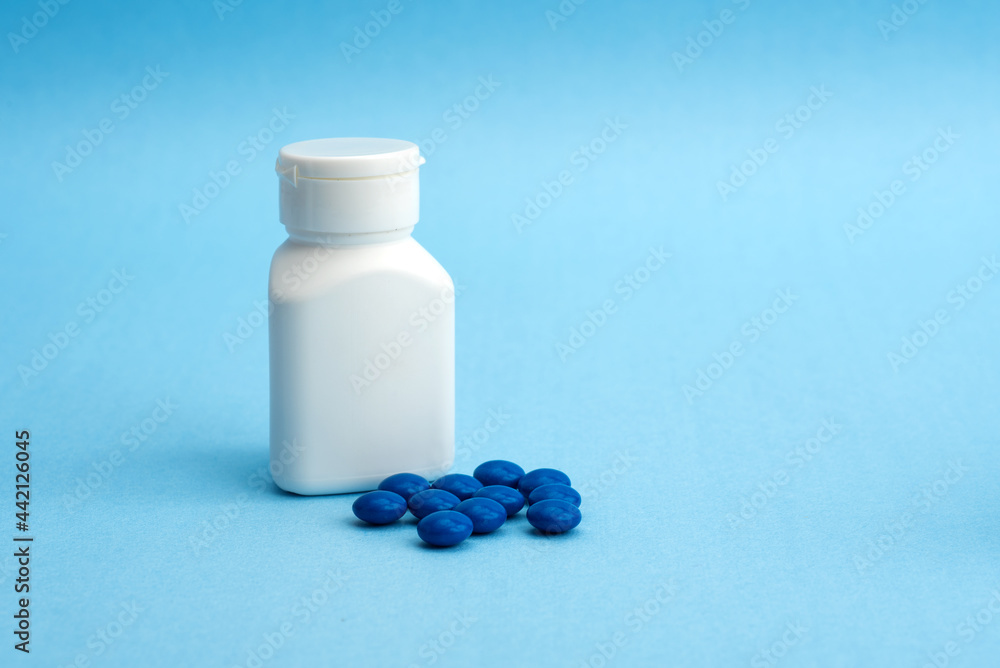 blank packaging white plastic bottle for medicine or supplement product design mock-up with tablet or pills. blank packaging white plastic bottle for medicine or supplement product design mock-up with tablet or pills.
